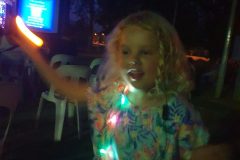 Jasmine Dancing with her candle and christmas light necklace