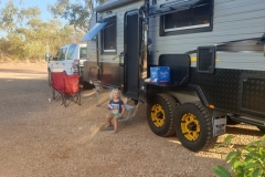 Caravan and tow vehicle from the rear Daly Waters 2019